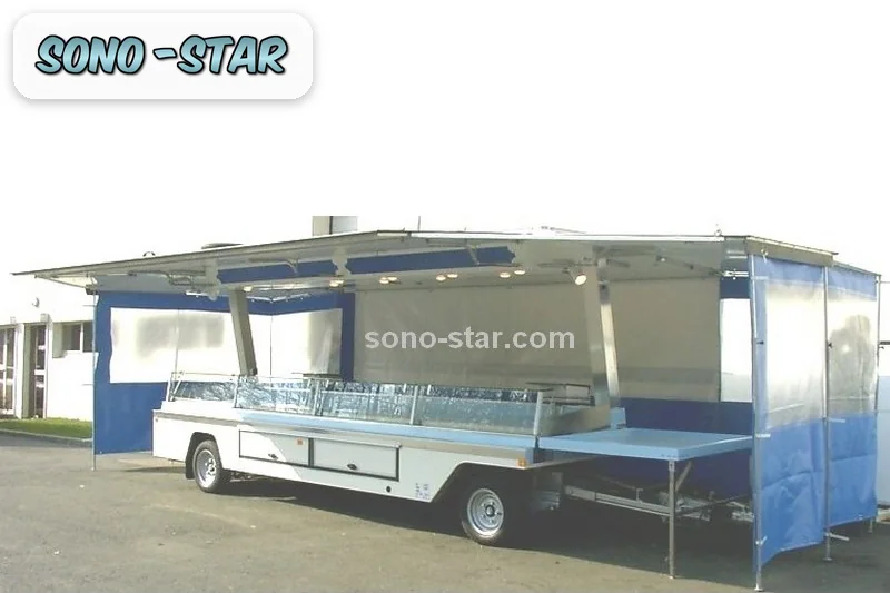 Camion magasin ambulant avec comptoir et spots d'éclairage sous le toit